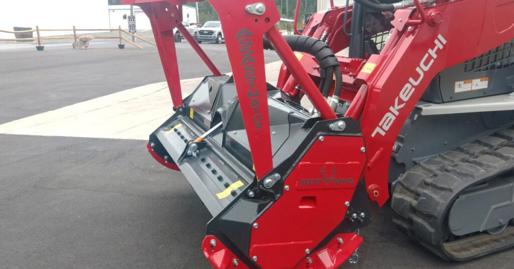 skid steer drum mulcher assassinator in parking lot 1