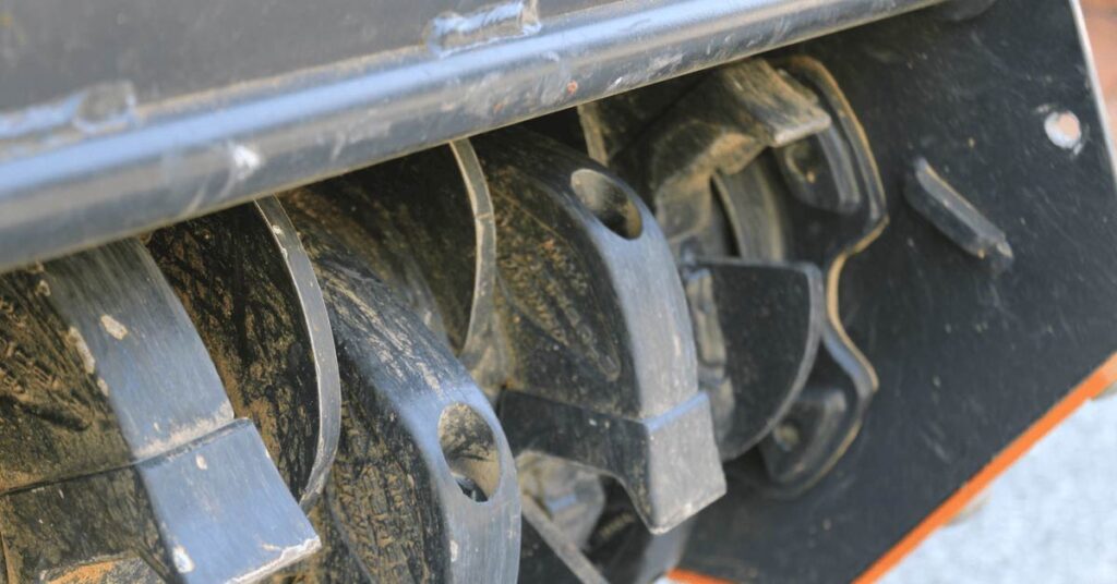 mulching teeth of a mini excavator forestry drum mulcher